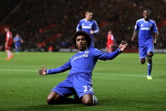 SOUTHAMPTON, ENGLAND - JANUARY 01:  Willian of Chelsea celebrates after scoring his team's second goal during the Barclays Premier League match between Southampton and Chelsea at St Mary's Stadium on January 1, 2014 in Southampton, England.  (Photo by War