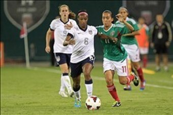 Sep 3, 2013; Washington, DC, USA; United States defender Crystal Dunn (6) and Mexico forward Monica Ocampo (11) battle for the ball in the first half at RFK Stadium. The United States won 7-0. Mandatory Credit: Geoff Burke-USA TODAY Sports