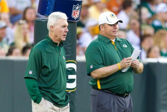 August 3, 2012; Green Bay, WI, USA; Green Bay Packers general manager Ted Thompson (left) talks with head coach Mike McCarthy prior to the family night scrimmage at Lambeau Field in Green Bay, WI. Mandatory Credit: Jeff Hanisch-USA TODAY Sports