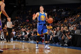 ONTARIO, CA - OCTOBER 5:  Nemanja Nedovic #8 of the Golden State Warriors brings the ball up the floor against the Los Angeles Lakers at Citizens Business Bank Arena on October 5, 2013 in Ontario, California. NOTE TO USER: User expressly acknowledges and 