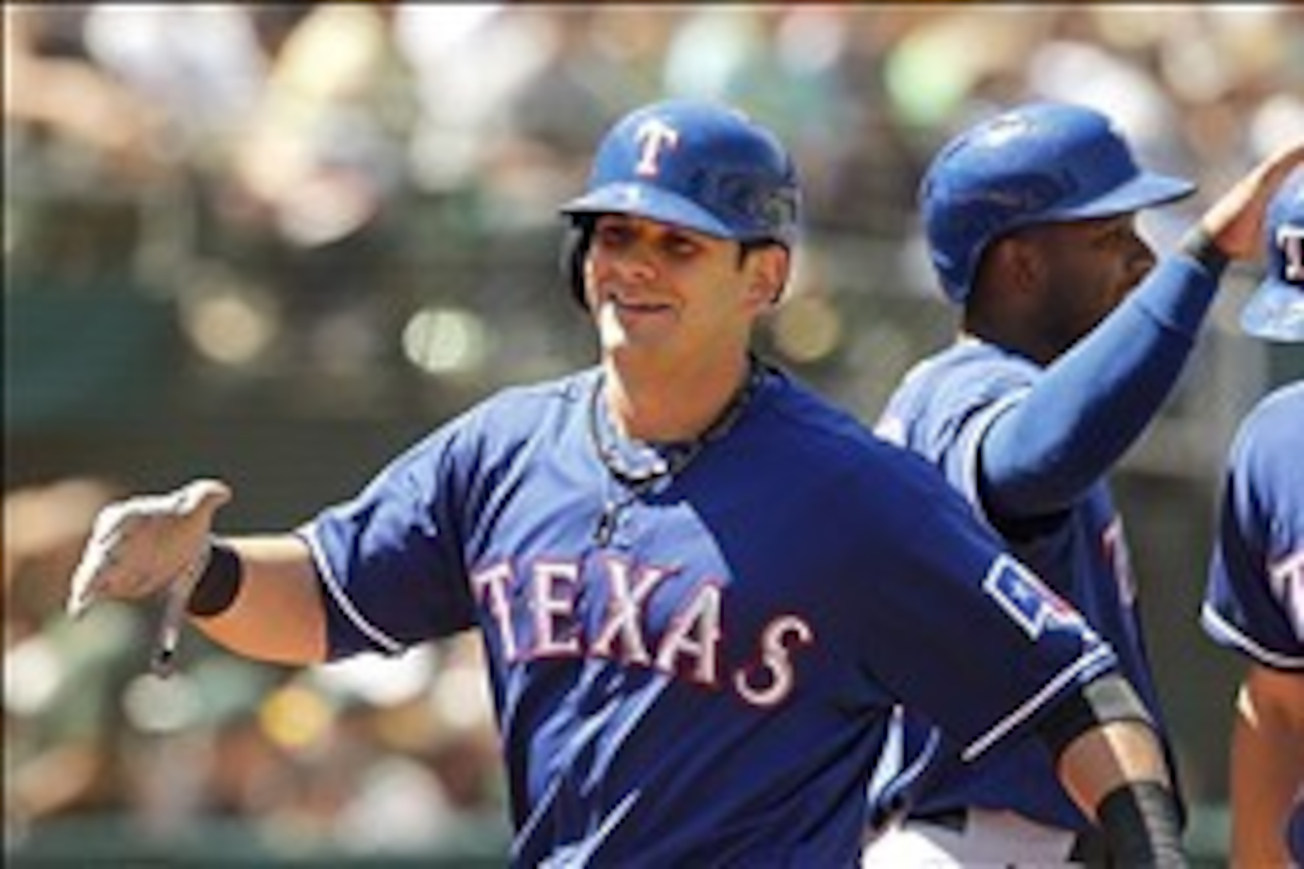 Aug 4, 2013; Oakland, CA, USA; Texas Rangers infielder Mitch Moreland (18) reacts after hitting a home run against the Oakland Athletics in the seventh inning at O.Co Coliseum. Mandatory Credit: Cary Edmondson-USA TODAY Sports