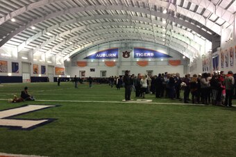 Fans created an impromptu "Tiger Walk" that stretched the length of Auburn's full-sized indoor practice field.
