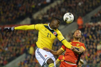BRUSSELS, BELGIUM - NOVEMBER 14:  Jackson Martinez of Colombia wins the header over Mousa Dembele of Belgium during the International Friendly match between Belgium and Colombia at King Baudouin Stadium on November 14, 2013 in Brussels, Belgium.  (Photo b