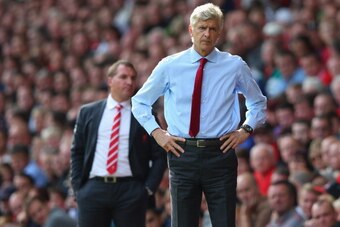 LIVERPOOL, ENGLAND - SEPTEMBER 02:  Arsene Wenger the manager of Arsenal and Brendan Rodgers the manager of Liverpool look on during the Barclays Premier League match between Liverpool and  Arsenal at Anfield on September 2, 2012 in Liverpool, England.  (