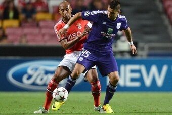 LISBON, PORTUGAL - SEPTEMBER 17:  Aleksandar Mitrovic of RSC Anderlecht is challenged by Luisao of SL Benfica during the UEFA Champions League group stage match between SL Benfica and RSC Anderlecht held on September 17, 2013 at the Estadio do Sport Lisbo