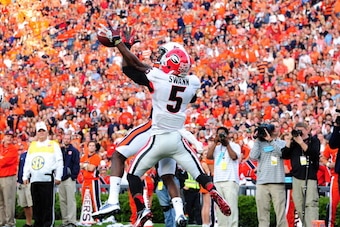 AUBURN, AL - NOVEMBER 16: Damian Swann #5 of the Georgia Bulldogs knocks away a pass intended for Sammie Coates #18 of the Auburn Tigers at Jordan-Hare Stadium on November 16, 2013 in Auburn Alabama. (Photo by Scott Cunningham/Getty Images)