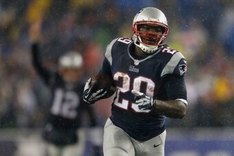 FOXBORO, MA - DECEMBER 29: LeGarrette Blount #29 of the New England Patriots scores a touchdown as Tom Brady #12 of the New England Patriots reacts during a game with the Buffalo Bills at Gillette Stadium on December 29, 2013 in Foxboro, Massachusetts. (P