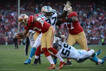 November 10, 2013; San Francisco, CA, USA; Carolina Panthers middle linebacker Luke Kuechly (59) sacks San Francisco 49ers quarterback Colin Kaepernick (7) during the fourth quarter at Candlestick Park. The Panthers defeated the 49ers 10-9. Mandatory Cred