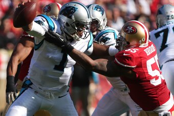 Nov 10, 2013; San Francisco, CA, USA; San Francisco 49ers outside linebacker Ahmad Brooks (55) extends for a sack against Carolina Panthers quarterback Cam Newton (1) during the first quarter at Candlestick Park. Mandatory Credit: Kelley L Cox-USA TODAY S