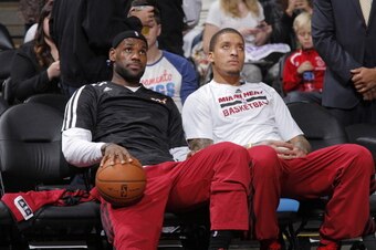 SACRAMENTO, CA - DECEMBER 27: LeBron James #6 and Michael Beasley #8 of the Miami Heat prior to the game against the Sacramento Kings of the  on December 27, 2013 at Sleep Train Arena in Sacramento, California. NOTE TO USER: User expressly acknowledges an