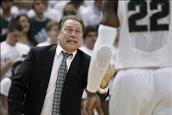 Jan 7, 2014; East Lansing, MI, USA; Michigan State Spartans head coach Tom Izzo coaches guard/forward Branden Dawson (22) during the first half against the Ohio State Buckeyes at Jack Breslin Student Events Center. Mandatory Credit: Raj Mehta-USA TODAY Sp