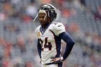 Dec 22, 2013; Houston, TX, USA; Denver Broncos cornerback Champ Bailey (24) warms up before the game against the Houston Texans at Reliant Stadium. Mandatory Credit: Thomas Campbell-USA TODAY Sports