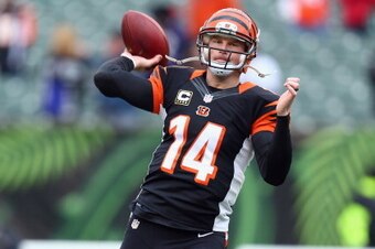 CINCINNATI, OH - DECEMBER 29:  Andy Dalton #14 of the Cincinnati Bengals throws a pass before the NFL game against the Baltimore Ravens  at Paul Brown Stadium on December 29, 2013 in Cincinnati, Ohio.  (Photo by Andy Lyons/Getty Images)