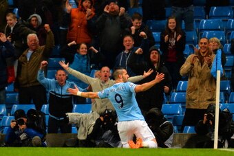 MANCHESTER, ENGLAND - JANUARY 08:  Alvaro Negredo of Manchester City celebrates scoring the opening goal during the Capital One Cup Semi-Final first leg match between Manchester City and West Ham United at Etihad Stadium on January 8, 2014 in Manchester, 