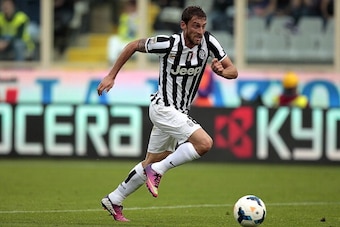 FLORENCE, ITALY - OCTOBER 20: Claudio Marchisio of Juventus in action during the Serie A match between ACF Fiorentina and Juventus at Stadio Artemio Franchi on October 20, 2013 in Florence, Italy. (Photo by Gabriele Maltinti/Getty Images) FLORENCE, ITALY - OCTOBER 20: Claudio Marchisio of Juventus in action during the Serie A match between ACF Fiorentina and Juventus at Stadio Artemio Franchi on October 20, 2013 in Florence, Italy. (Photo by Gabriele Maltinti/Getty Images)