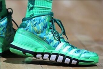 Mar 22, 2013; Dayton, OH, USA; Notre Dame Fighting Irish are wearing lime green camouflage Adidas shoes while playing against the Iowa State Cyclones during the second round of the 2013 NCAA tournament at University of Dayton Arena.  Mandatory Credit: Bri
