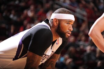HOUSTON, TX - DECEMBER 31:  DeMarcus Cousins #15 of the Sacramento Kings reacts to a play against the Houston Rockets on December 31, 2013 at the Toyota Center in Houston, Texas. NOTE TO USER: User expressly acknowledges and agrees that, by downloading an