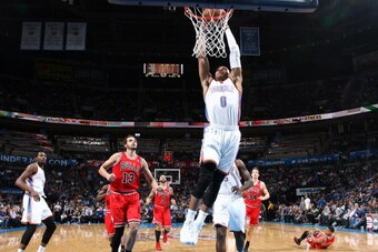 OKLAHOMA CITY, OK - DECEMBER 19: Russell Westbrook #0 of the Oklahoma City Thunder goes up for the dunk against the Chicago Bulls during an NBA game on December 19, 2013 at the Chesapeake Energy Arena in Oklahoma City, Oklahoma. NOTE TO USER: User express