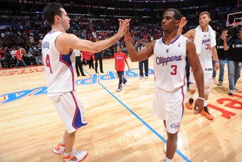 LOS ANGELES, CA - OCTOBER 31: Chris Paul #3 and J.J. Redick #4 of the Los Angeles Clippers high five after a game against the Golden State Warriors at STAPLES Center on October 31, 2013 at in Los Angeles, California. NOTE TO USER: User expressly acknowled LOS ANGELES, CA - OCTOBER 31: Chris Paul #3 and J.J. Redick #4 of the Los Angeles Clippers high five after a game against the Golden State Warriors at STAPLES Center on October 31, 2013 at in Los Angeles, California. NOTE TO USER: User expressly acknowled