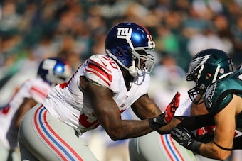 PHILADELPHIA, PA - OCTOBER 27:   Jason Pierre-Paul #90 of the New York Giants in action against the Philadelphia Eagles during their game at Lincoln Financial Field on October 27, 2013 in Philadelphia, Pennsylvania.  (Photo by Al Bello/Getty Images)