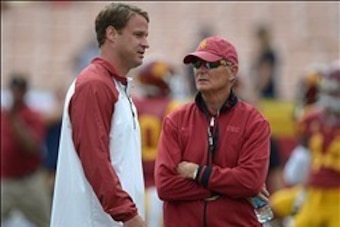 Sep 21, 2013; Los Angeles, CA, USA; Southern California Trojans coach Lane Kiffin (right) and athletic director Pat Haden before the game against the Utah State Aggies at the Los Angeles Memorial Coliseum. Mandatory Credit: Kirby Lee-USA TODAY Sports