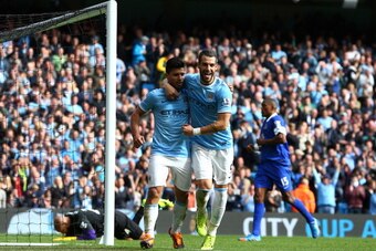 MANCHESTER, ENGLAND - OCTOBER 05: Sergio Aguero of Manchester City celebrates with teammate Alvaro Negredo (R) after scoring his team's third goal from the penalty spot during the Barclays Premier League match between Manchester City and Everton at Etiha MANCHESTER, ENGLAND - OCTOBER 05: Sergio Aguero of Manchester City celebrates with teammate Alvaro Negredo (R) after scoring his team's third goal from the penalty spot during the Barclays Premier League match between Manchester City and Everton at Etiha