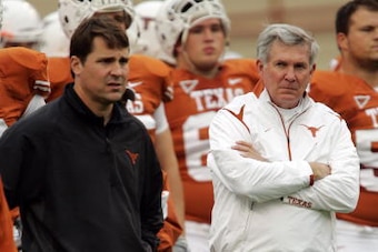 AUSTIN, TX - OCTOBER 10:  Defensive coordinator Will Muschamp and head coach Mack Brown of the Texas Longhorns lead their team in pregame drills before playing the Colorado Buffaloes  on October 10, 2009 at Darrell K Royal-Texas Memorial Stadium in Austin