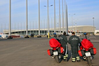 ADLER, RUSSIA - JANUARY 09:  Security personnel stand next to their motorcycles in front of Adler Arena on the Olympic Park in the Coastal Cluster on January 9, 2014 in Alder, Russia. The region will host the Sochi 2014 Winter Olympics which start on Febr