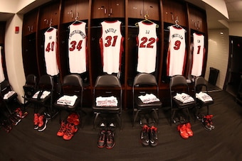 NEW YORK, NY - JANUARY 10:  Udonis Haslem #40, Ray Allen #34, Shane Battier #31, James Jones #22, Rashard Lewis #9 and  Chris Bosh #1 of the Miami Heat jerseys hang in the lockeroom prior to a game at the Barclays Center on January 10, 2014 in the Brookly