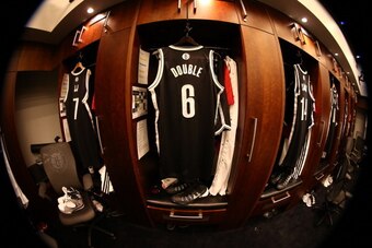 NEW YORK, NY - JANUARY 10:  Alan Anderson #6 of the Brooklyn Nets jersey hangs in his locker prior to a game at the Barclays Center on January 10, 2014 in the Brooklyn borough of New York City.  NOTE TO USER: User expressly acknowledges and agrees that, b