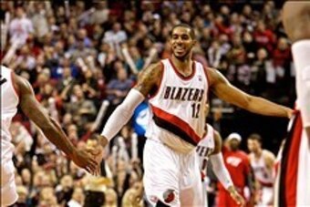 Jan 8, 2014; Portland, OR, USA; Portland Trail Blazers power forward LaMarcus Aldridge (12) reacts after making a basket in the fourth quarter against the Orlando Magic at the Moda Center. Mandatory Credit: Craig Mitchelldyer-USA TODAY Sports