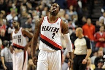 Jan. 04, 2014; Portland, OR, USA; Portland Trail Blazers shooting guard Wesley Matthews (2) reacts after missing a free throw late in the fourth quarter of the game against the Philadelphia 76ers at the Moda Center. The Sixers won the game 101-99. Mandato