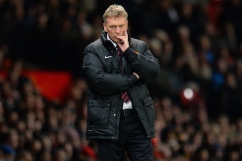 MANCHESTER, ENGLAND - JANUARY 11: Manchester United Manager David Moyes looks on during the Barclays Premier League match between Manchester United and Swansea City at Old Trafford on January 11, 2014 in Manchester, England. (Photo by Shaun Botterill/Ge MANCHESTER, ENGLAND - JANUARY 11: Manchester United Manager David Moyes looks on during the Barclays Premier League match between Manchester United and Swansea City at Old Trafford on January 11, 2014 in Manchester, England. (Photo by Shaun Botterill/Ge