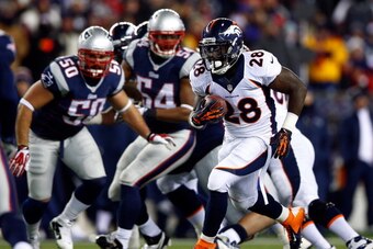 FOXBORO, MA - NOVEMBER 24: Running back Montee Ball #28 of the Denver Broncos carries the ball against the New England Patriots during a game at Gillette Stadium on November 24, 2013 in Foxboro, Massachusetts.  (Photo by Jared Wickerham/Getty Images)