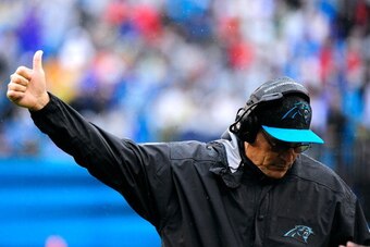 CHARLOTTE, NC - DECEMBER 22:  head coach Ron Rivera of the Carolina Panthers flashes a thumbs-up during a win against the New Orleans Saints during their game at Bank of America Stadium on December 22, 2013 in Charlotte, North Carolina. The Panthers won 1