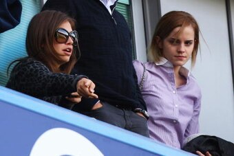 LONDON - MARCH 15: Chelsea owner Roman Abramovich looks on with his girlfriend Daria Zhukova and actress Emma Watson (R) during the Barclays Premier League match between Chelsea and Manchester City at Stamford Bridge on March 15, 2009 in London, England. 