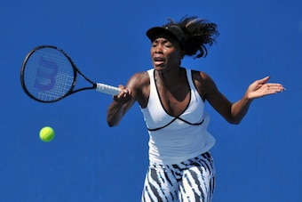 MELBOURNE, AUSTRALIA - JANUARY 10: Venus Williams of the USA plays a forehand during a practice session ahead of the 2014 Australian Open at Melbourne Park on January 10, 2014 in Melbourne, Australia.  (Photo by Vince Caligiuri/Getty Images)