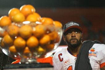 MIAMI GARDENS, FL - JANUARY 03: Tajh Boyd #10 of the Clemson Tigers looks on from the trophy podium after defeating the Ohio State Buckeyes during the Discover Orange Bowl at Sun Life Stadium on January 3, 2014 in Miami Gardens, Florida. Clemson defeated 