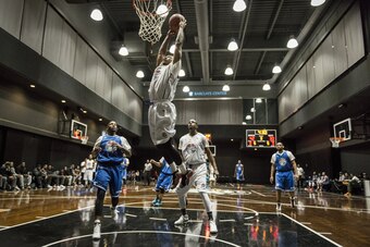 Team Atlanta throws down a dunk during Thursday's action. Team Atlanta throws down a dunk during Thursday's action.