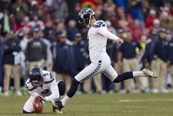 SAN FRANCISCO, CA - DECEMBER 08: Kicker Steven Hauschka #4 of the Seattle Seahawks kicks a 31-yard field goal against the San Francisco 49ers with Jon Ryan holding in the fourth quarter on December 8, 2013 at Candlestick Park in San Francisco, California.