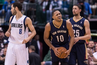 Jan 11, 2014; Dallas, TX, USA; New Orleans Pelicans shooting guard Eric Gordon (10) reacts to a call during the second half against the Dallas Mavericks at the American Airlines Center. The Mavericks defeated the Pelicans 110-107. Mandatory Credit: Jerome