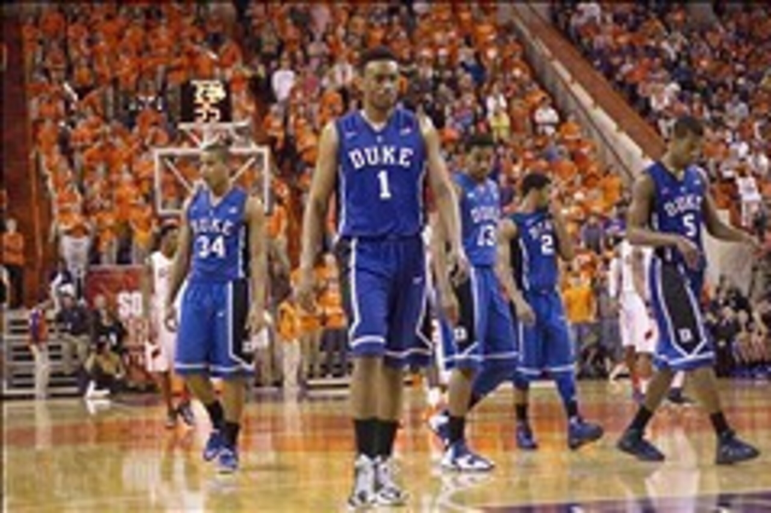 Jan 11, 2014; Clemson, SC, USA; Duke Blue Devils guard Andre Dawkins (34) , forward Jabari Parker (1) , guard Matt Jones (13) , guard Quinn Cook (2) and forward Rodney Hood (5) react during the second half against the Clemson Tigers at J.C. Littlejohn Col