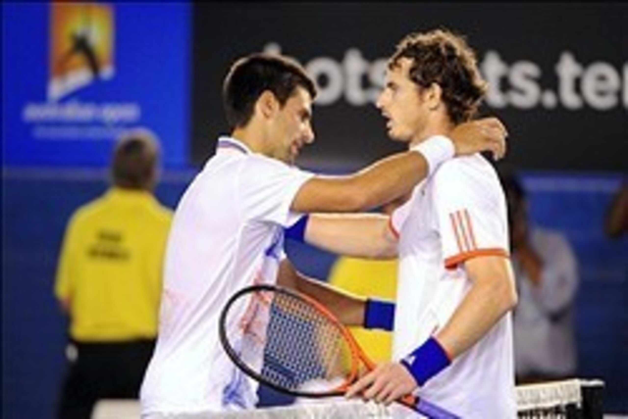 Jan 27, 2012; Melbourne, AUSTRALIA; Novak Djokovic (SRB), left, hugs Andy Murray (GBR) after their match on day twelve of the 2012 Australian Open at Melbourne Park.  Mandatory Credit: Pierre Lahalle/Presse Sports via USA TODAY Sports