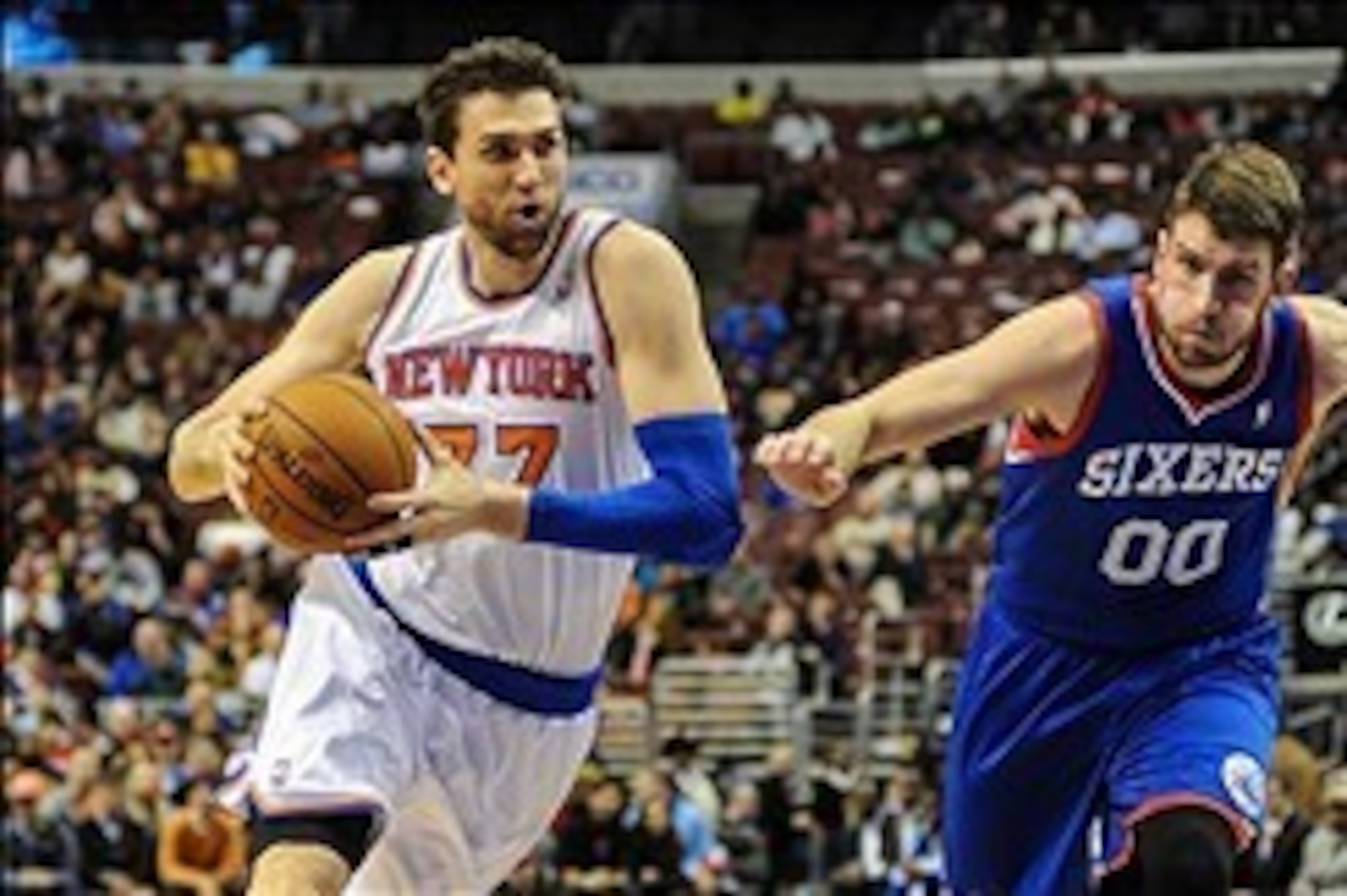 Jan 11, 2014; Philadelphia, PA, USA; New York Knicks power forward Andrea Bargnani (77) drives toward the net during the game against the Philadelphia 76ers at the Wells Fargo Center. Mandatory Credit: John Geliebter-USA TODAY Sports