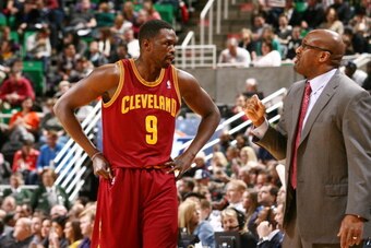 SALT LAKE CITY, UT - JANUARY 10:  Head Coach of the Cleveland Cavaliers, Mike Brown talks with Luol Deng #9 during a break in play against the Utah Jazz at EnergySolutions Arena on January 10, 2014 in Salt Lake City, Utah. NOTE TO USER: User expressly ack