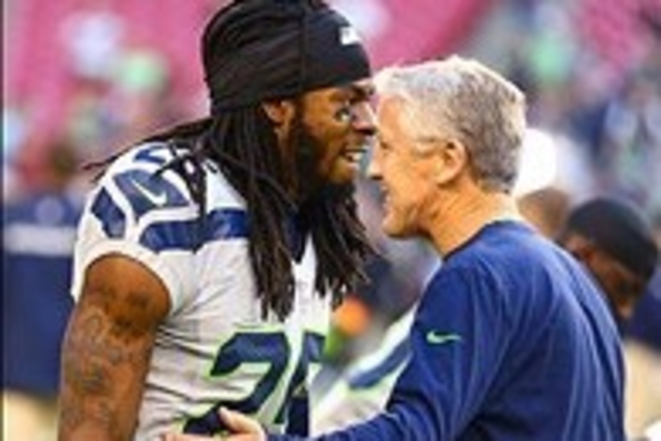 Oct 17, 2013; Phoenix, AZ, USA; Seattle Seahawks cornerback Richard Sherman (left) with head coach Pete Carroll against the Arizona Cardinals at University of Phoenix Stadium. Mandatory Credit: Mark J. Rebilas-USA TODAY Sports