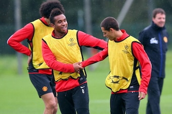 MANCHESTER, ENGLAND - OCTOBER 22:  Anderson and Javier Hernandez of Manchester United joke around during a training session at Aon Training Complex on October 22, 2013 in Manchester, England.  (Photo by Alex Livesey/Getty Images)