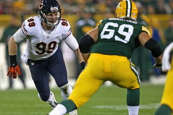 GREEN BAY, WI - NOVEMBER 04:  Shea McClellin #99 of the Chicago Bears rushes against David Bakhtiari #69 of the Green Bay Packers at Lambeau Field on November 4, 2013 in Green Bay, Wisconsin. The Bears defeated the Packers 27-20.  (Photo by Jonathan Danie