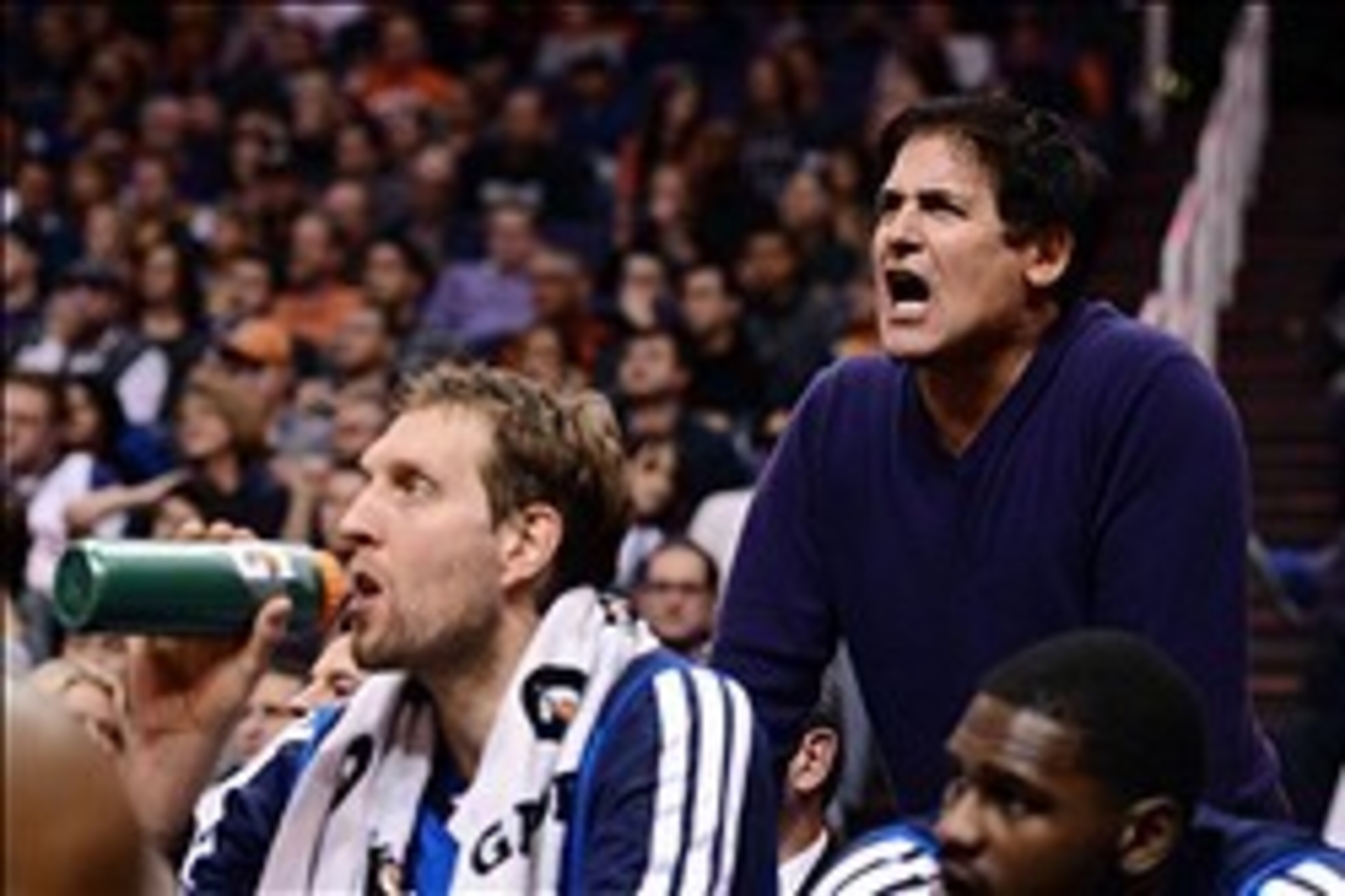 Dec 21, 2013; Phoenix, AZ, USA; Dallas Mavericks team owner Mark Cuban yells from the sidelines in the second half of the game against the Phoenix Suns at US Airways Center. The Suns won 123-108.  Mandatory Credit: Jennifer Stewart-USA TODAY Sports