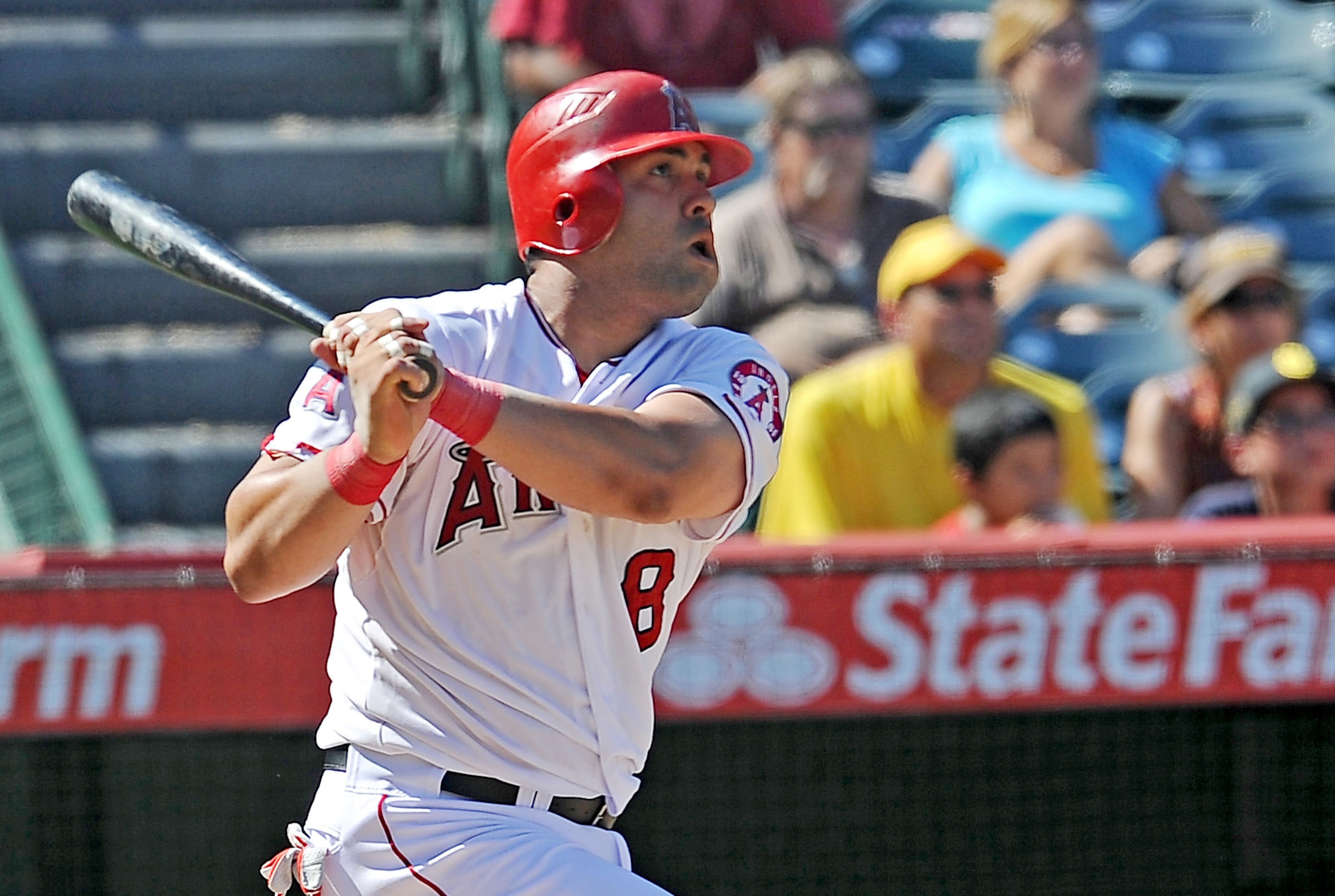 Sept. 23, 2012; Anaheim, CA, USA;  Los Angeles Angels designated hitter Kendrys Morales (8) hits a 2-run home run in the sixth inning of the game against the Chicago White Sox at Angel Stadium. Mandatory Credit: Jayne Kamin-Oncea-USA TODAY Sports